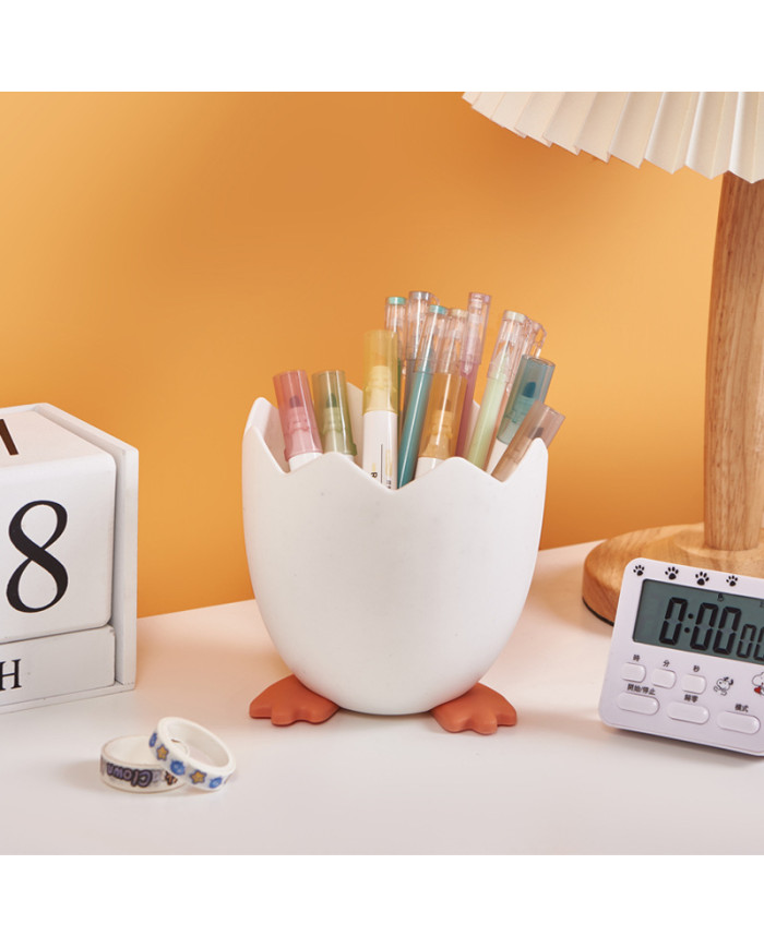 Przybornik na długopisy w kształcie skorupki jajka