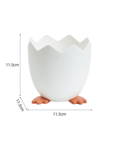 Przybornik na długopisy w kształcie skorupki jajka